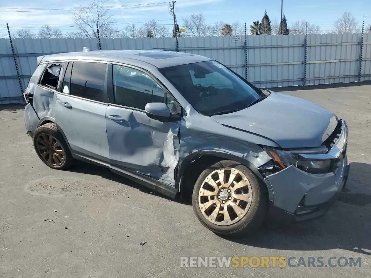 4 Photograph of a damaged car 5FNYF8H53PB021775 HONDA PASSPORT 2023