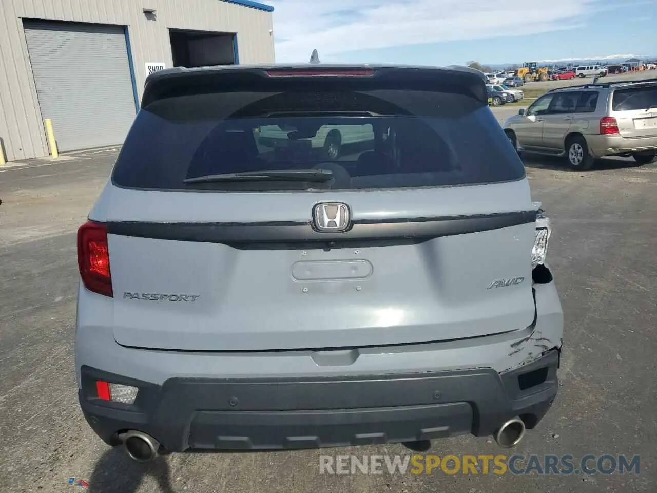 6 Photograph of a damaged car 5FNYF8H53PB021775 HONDA PASSPORT 2023
