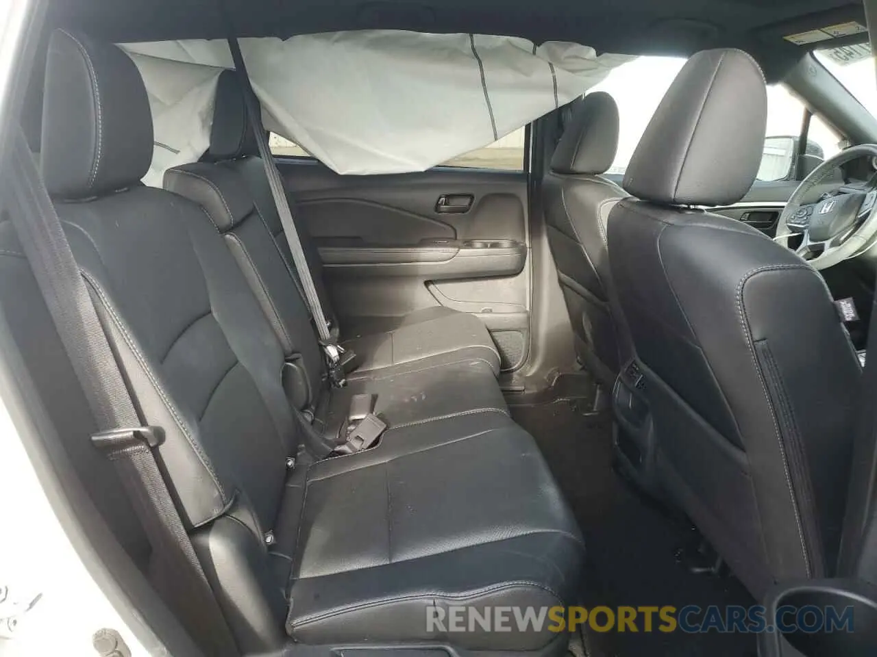 11 Photograph of a damaged car 5FNYF8H54PB002118 HONDA PASSPORT 2023