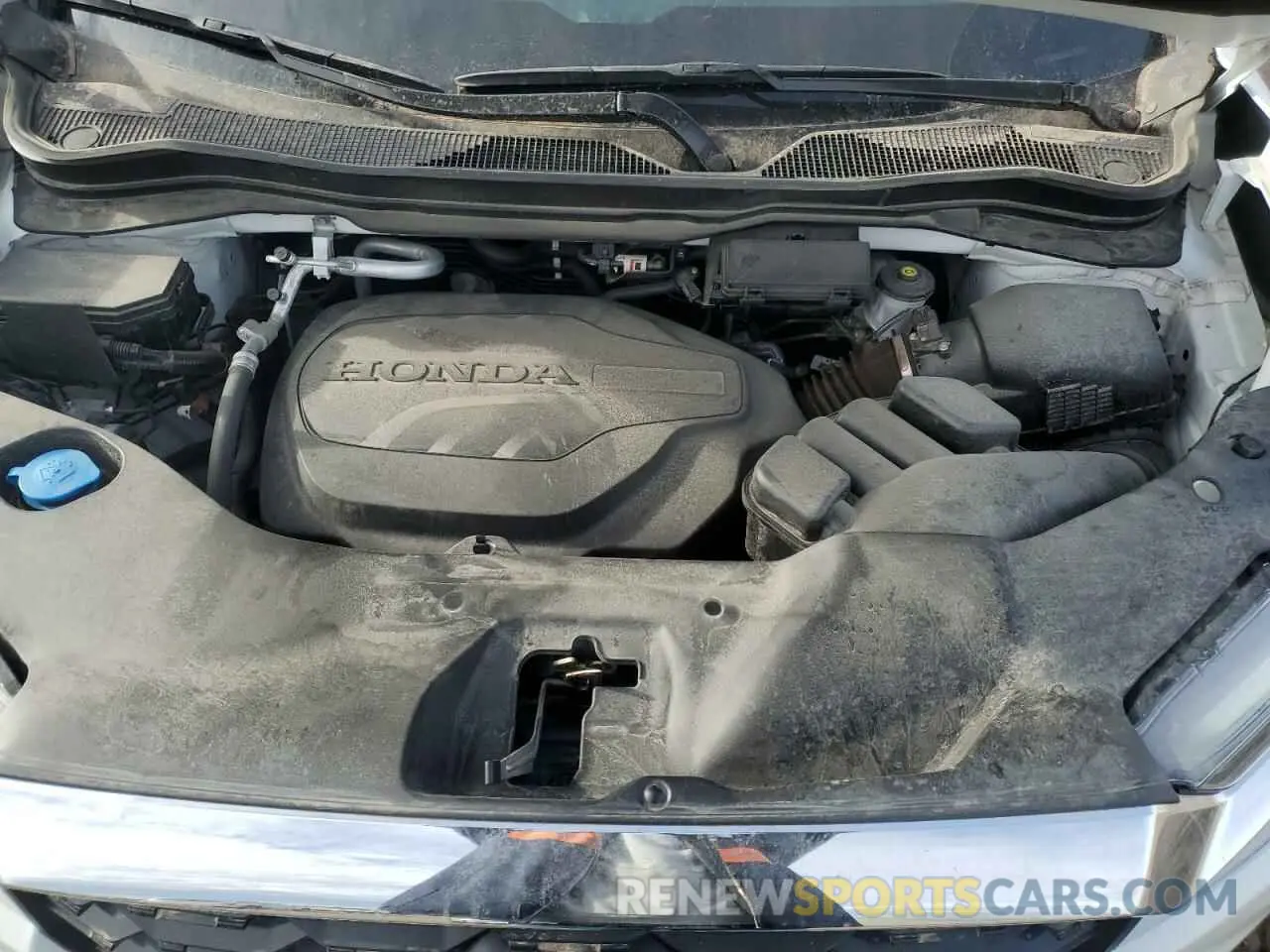 12 Photograph of a damaged car 5FNYF8H54PB002118 HONDA PASSPORT 2023