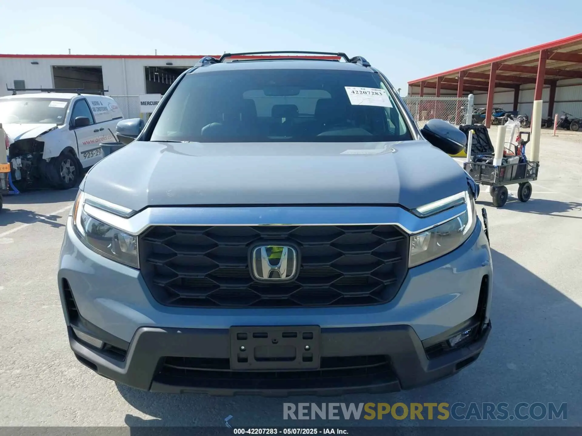 12 Photograph of a damaged car 5FNYF8H54PB008940 HONDA PASSPORT 2023