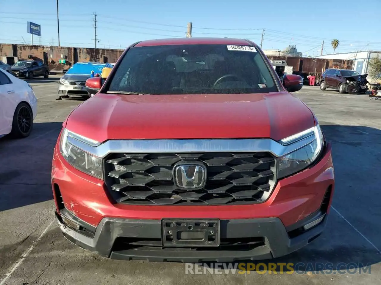 5 Photograph of a damaged car 5FNYF8H54PB036057 HONDA PASSPORT 2023