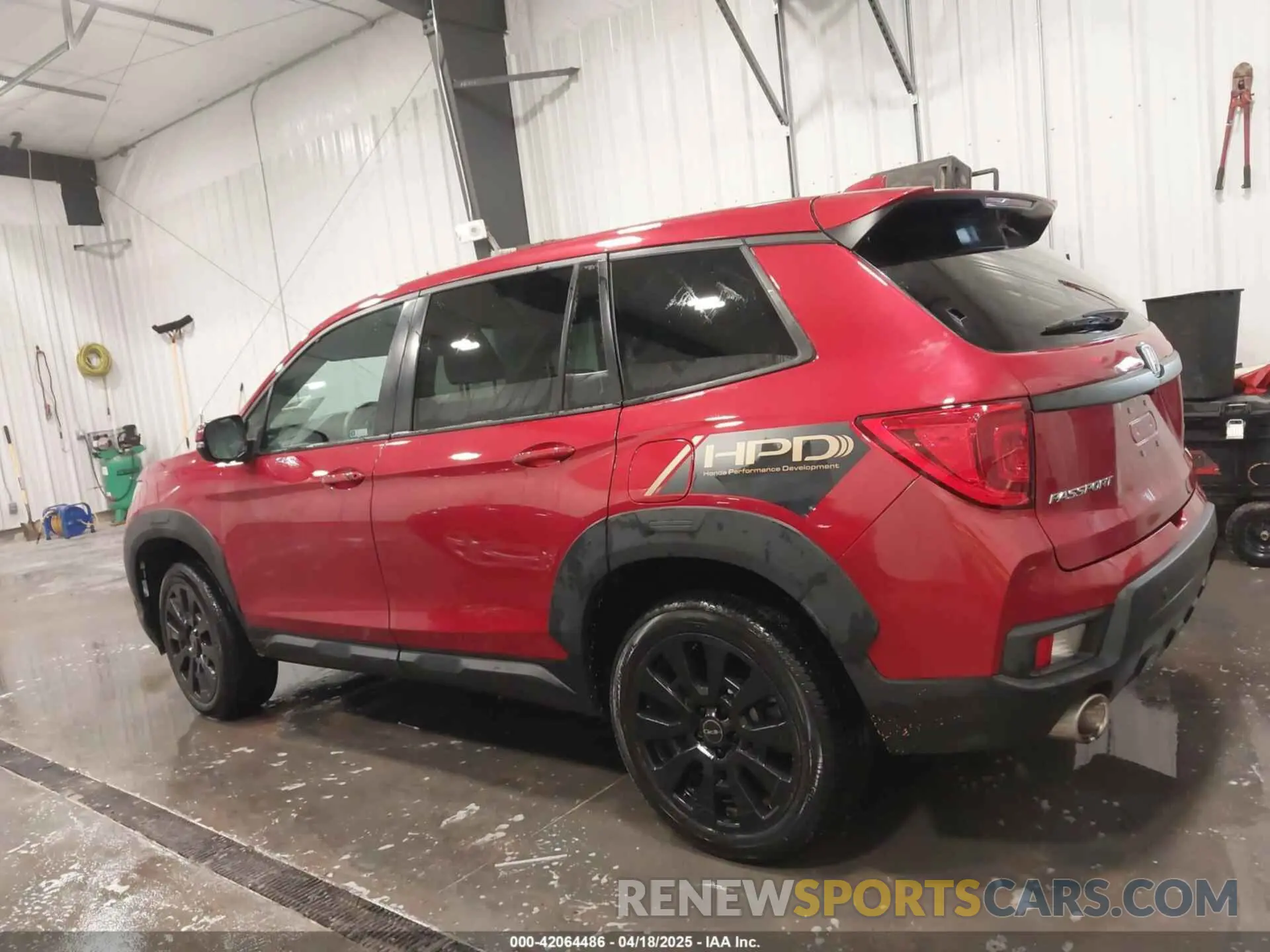14 Photograph of a damaged car 5FNYF8H56PB007255 HONDA PASSPORT 2023