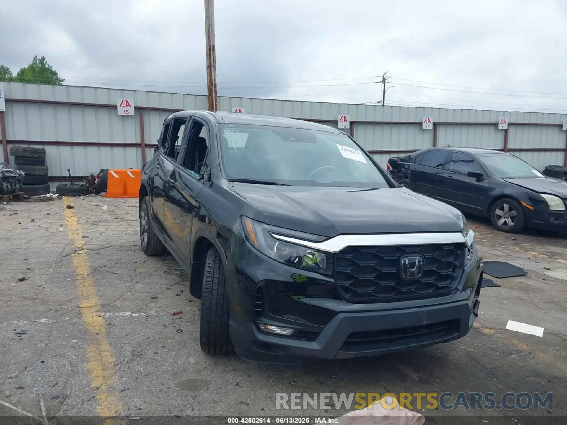 1 Photograph of a damaged car 5FNYF8H56PB009779 HONDA PASSPORT 2023
