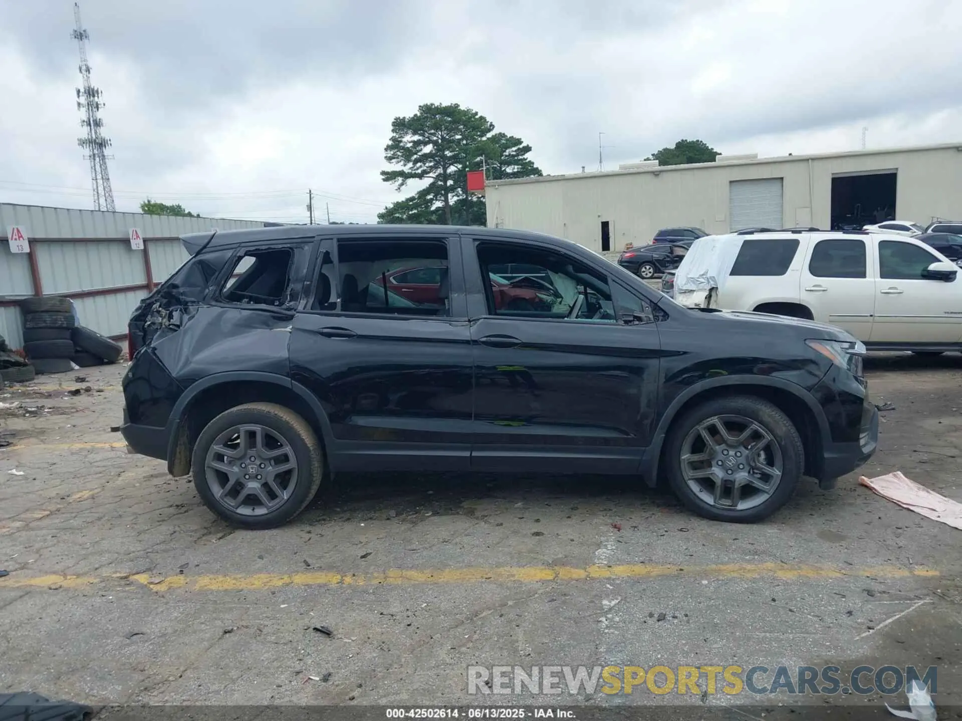 12 Photograph of a damaged car 5FNYF8H56PB009779 HONDA PASSPORT 2023