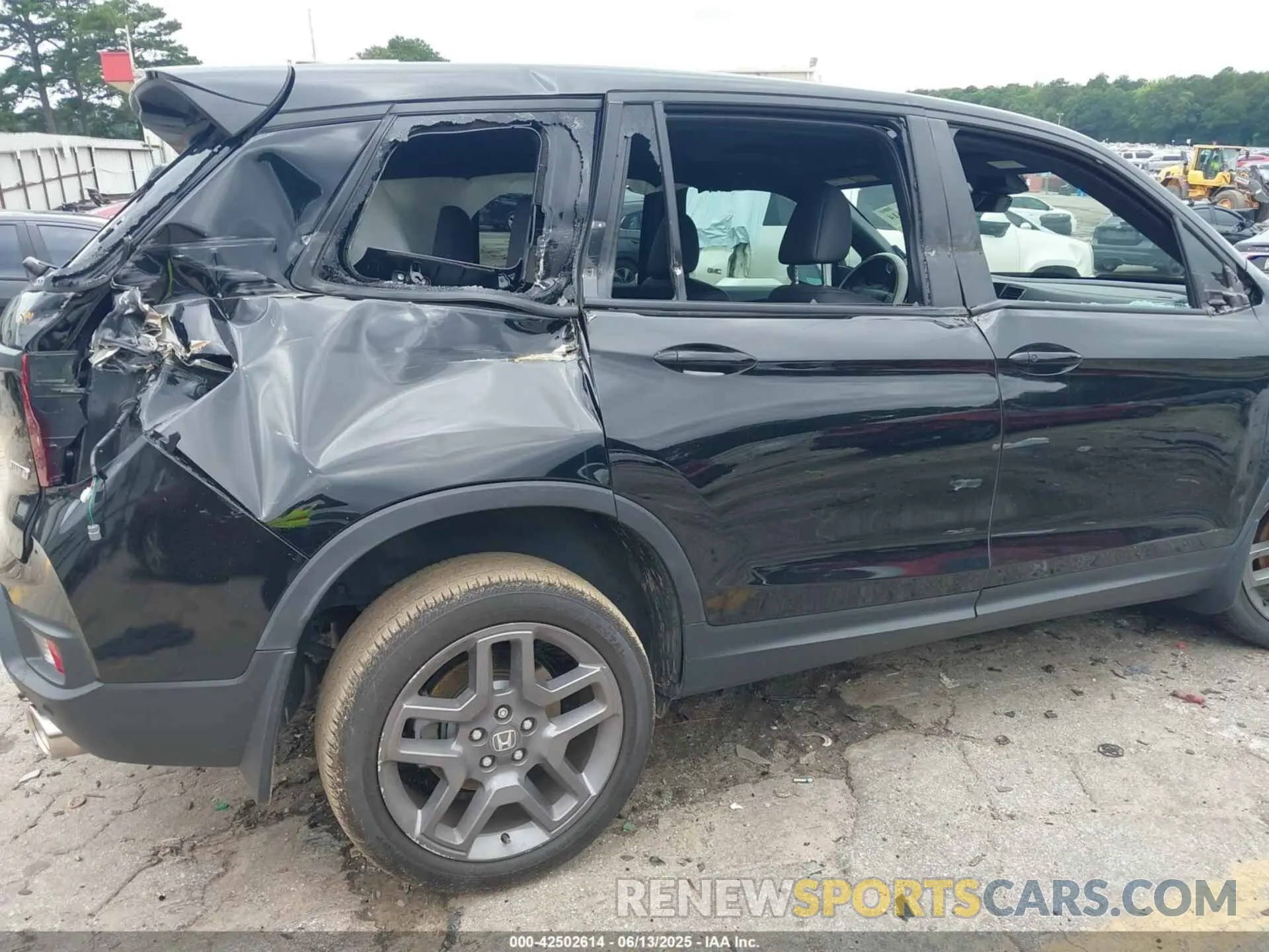 6 Photograph of a damaged car 5FNYF8H56PB009779 HONDA PASSPORT 2023