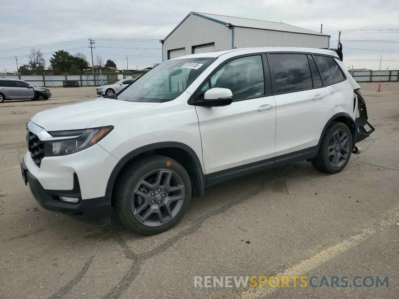 1 Photograph of a damaged car 5FNYF8H56PB023651 HONDA PASSPORT 2023