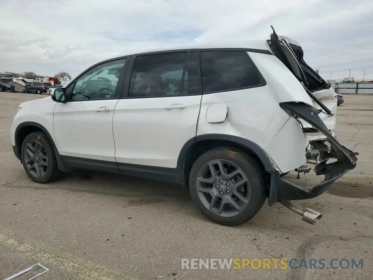 2 Photograph of a damaged car 5FNYF8H56PB023651 HONDA PASSPORT 2023