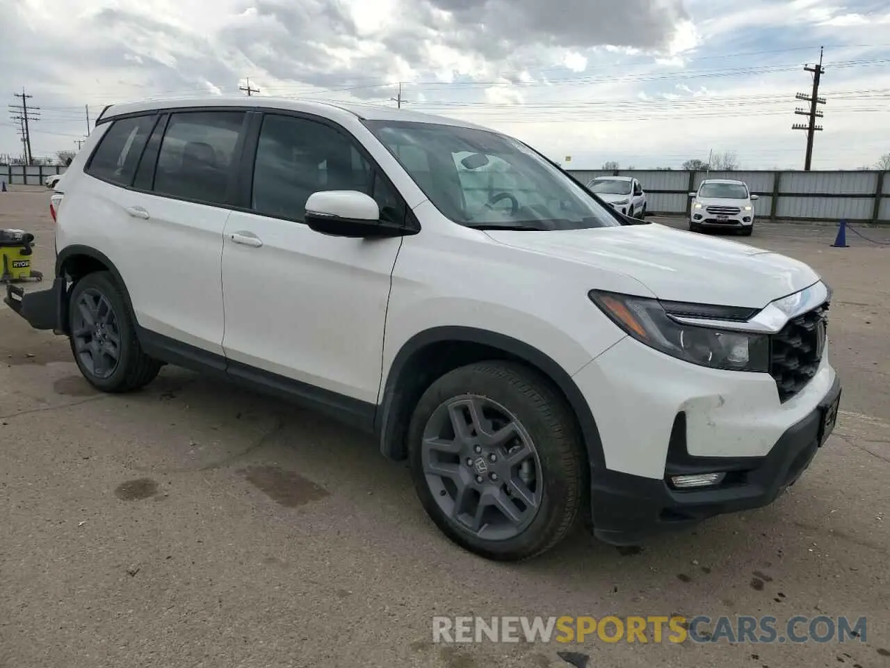 4 Photograph of a damaged car 5FNYF8H56PB023651 HONDA PASSPORT 2023