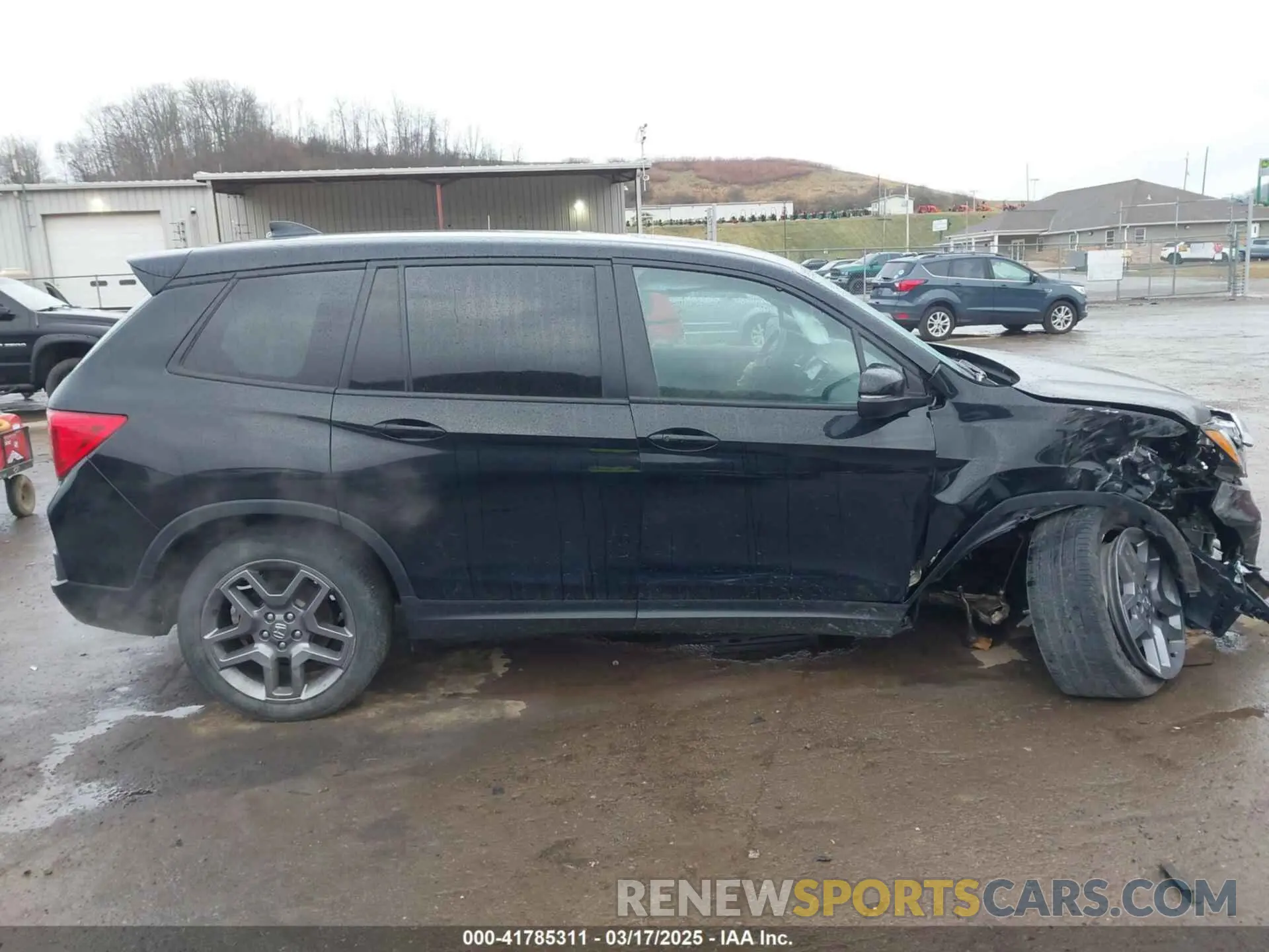 14 Photograph of a damaged car 5FNYF8H56PB024816 HONDA PASSPORT 2023