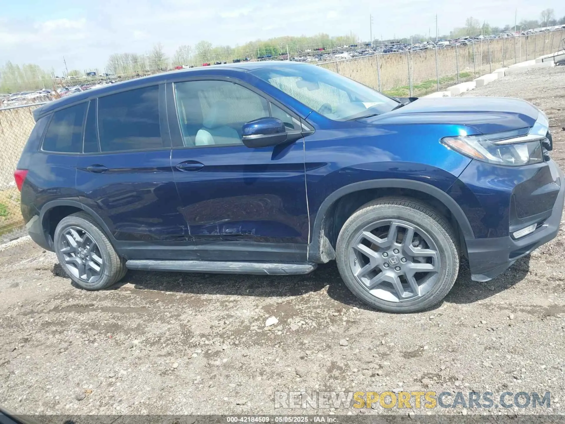 13 Photograph of a damaged car 5FNYF8H57PB004896 HONDA PASSPORT 2023
