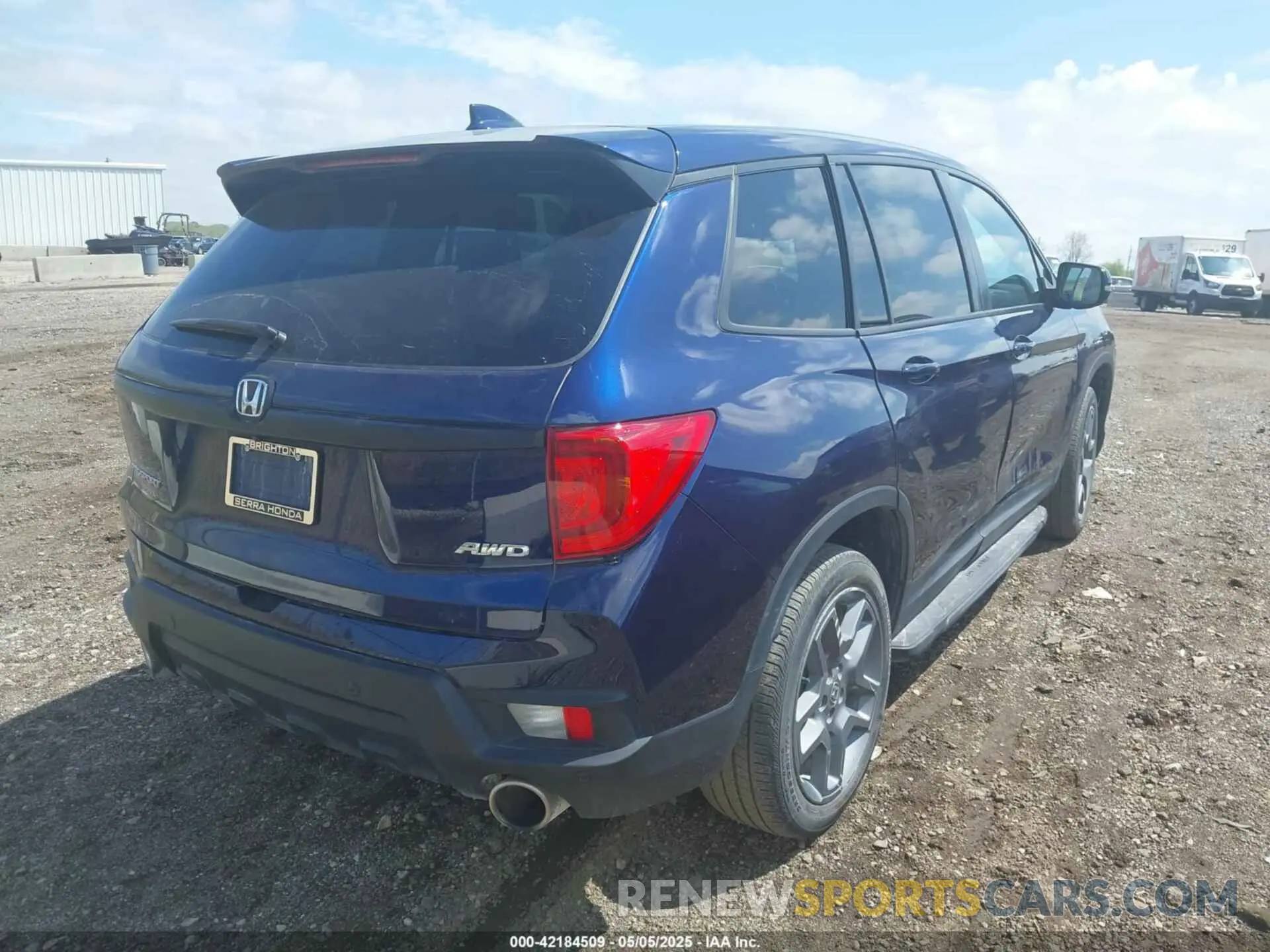4 Photograph of a damaged car 5FNYF8H57PB004896 HONDA PASSPORT 2023