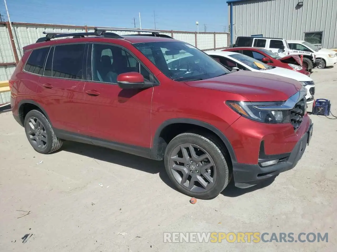 4 Photograph of a damaged car 5FNYF8H57PB007264 HONDA PASSPORT 2023