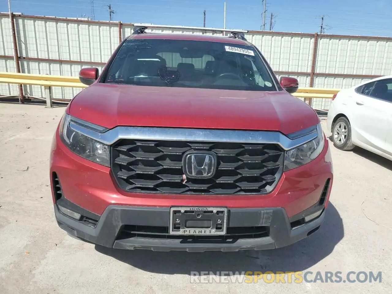 5 Photograph of a damaged car 5FNYF8H57PB007264 HONDA PASSPORT 2023