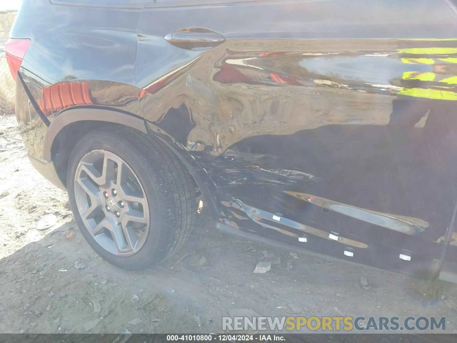 12 Photograph of a damaged car 5FNYF8H57PB019186 HONDA PASSPORT 2023