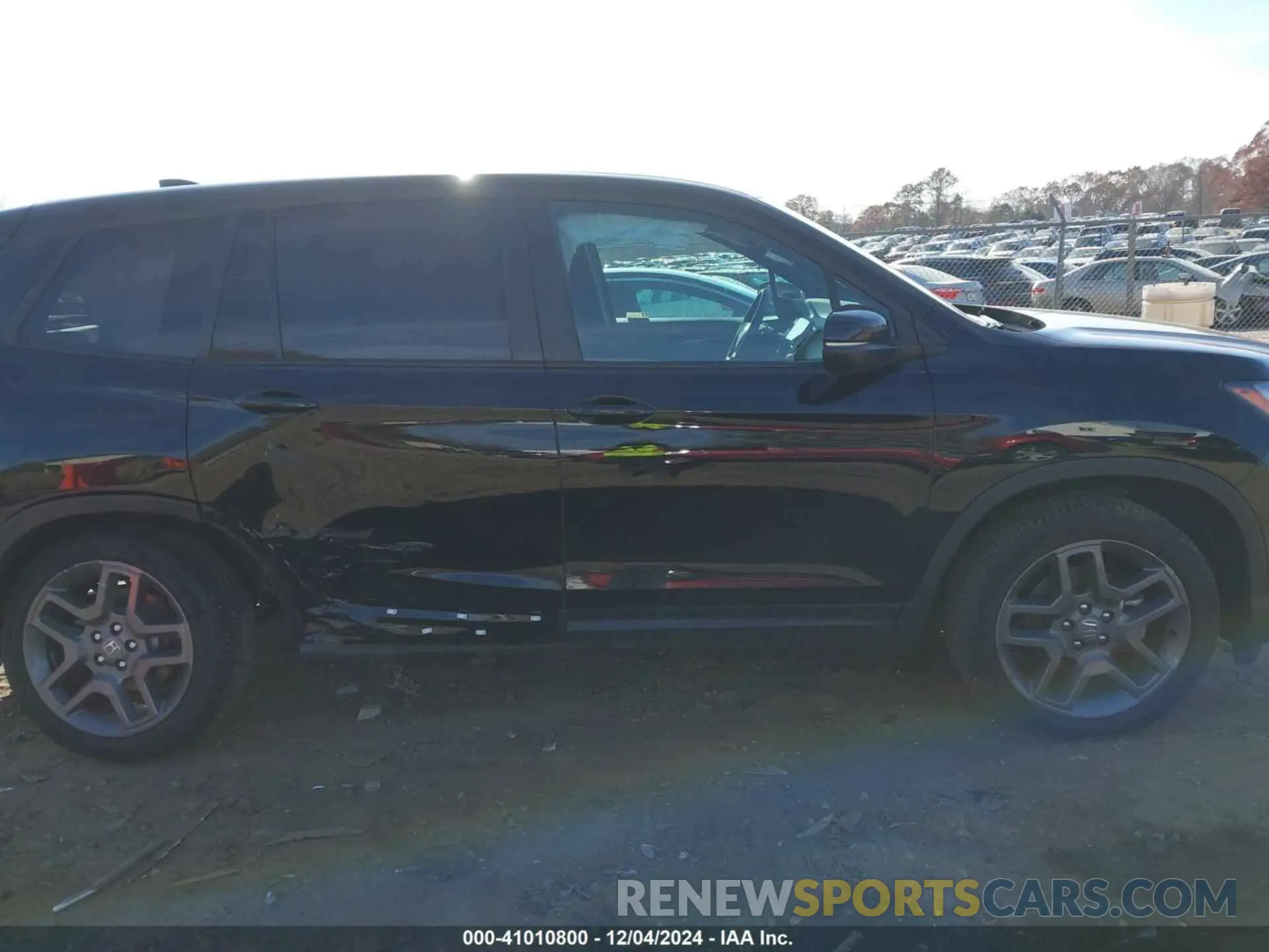 14 Photograph of a damaged car 5FNYF8H57PB019186 HONDA PASSPORT 2023