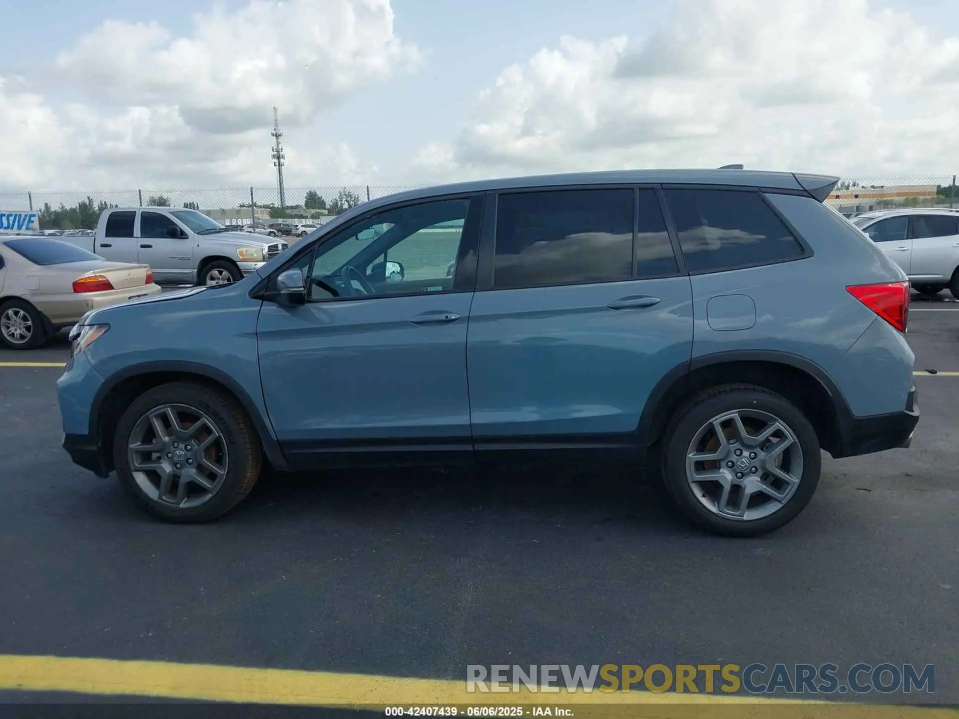 14 Photograph of a damaged car 5FNYF8H57PB020516 HONDA PASSPORT 2023