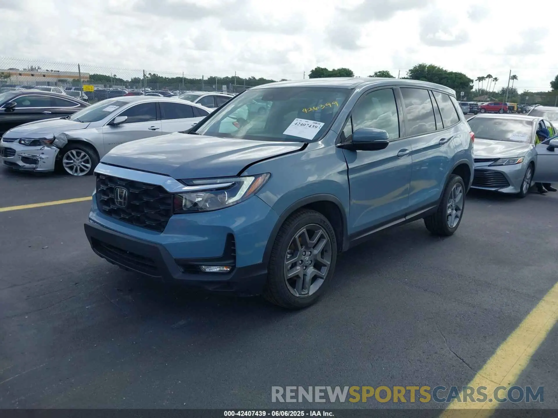 2 Photograph of a damaged car 5FNYF8H57PB020516 HONDA PASSPORT 2023