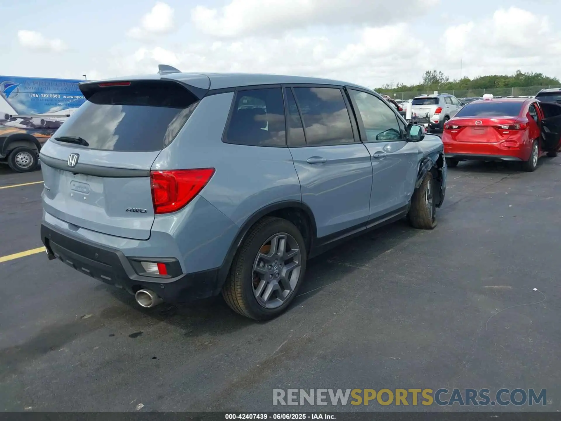 4 Photograph of a damaged car 5FNYF8H57PB020516 HONDA PASSPORT 2023