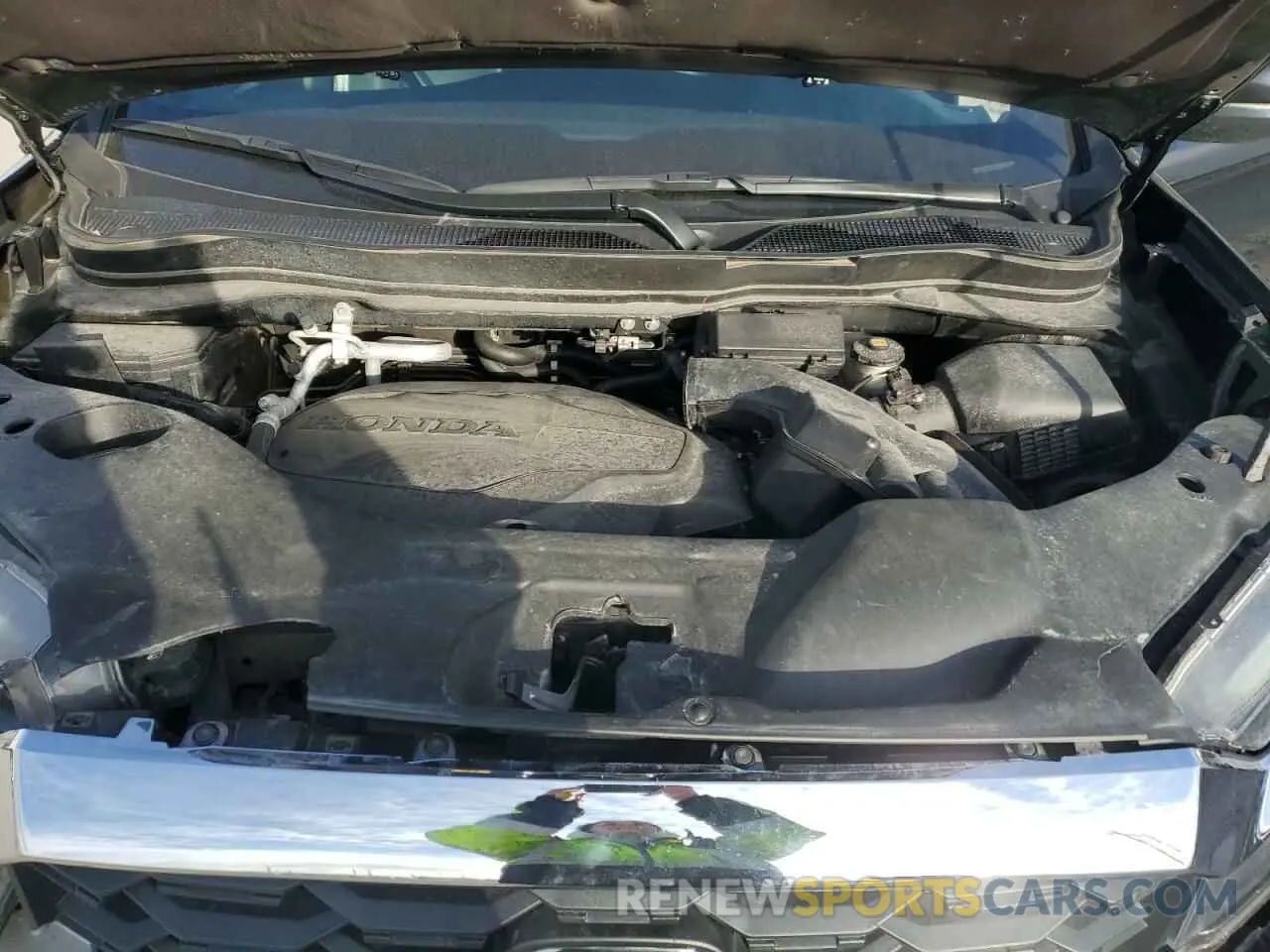12 Photograph of a damaged car 5FNYF8H58PB009525 HONDA PASSPORT 2023