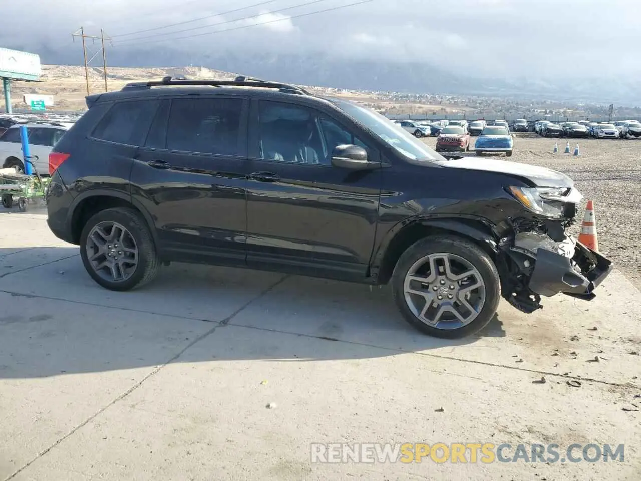 4 Photograph of a damaged car 5FNYF8H58PB009525 HONDA PASSPORT 2023