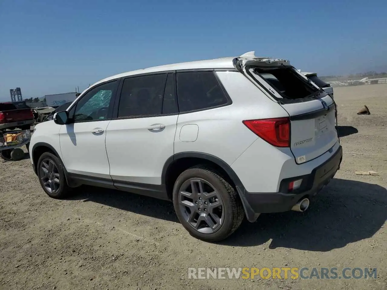 2 Photograph of a damaged car 5FNYF8H59PB010280 HONDA PASSPORT 2023