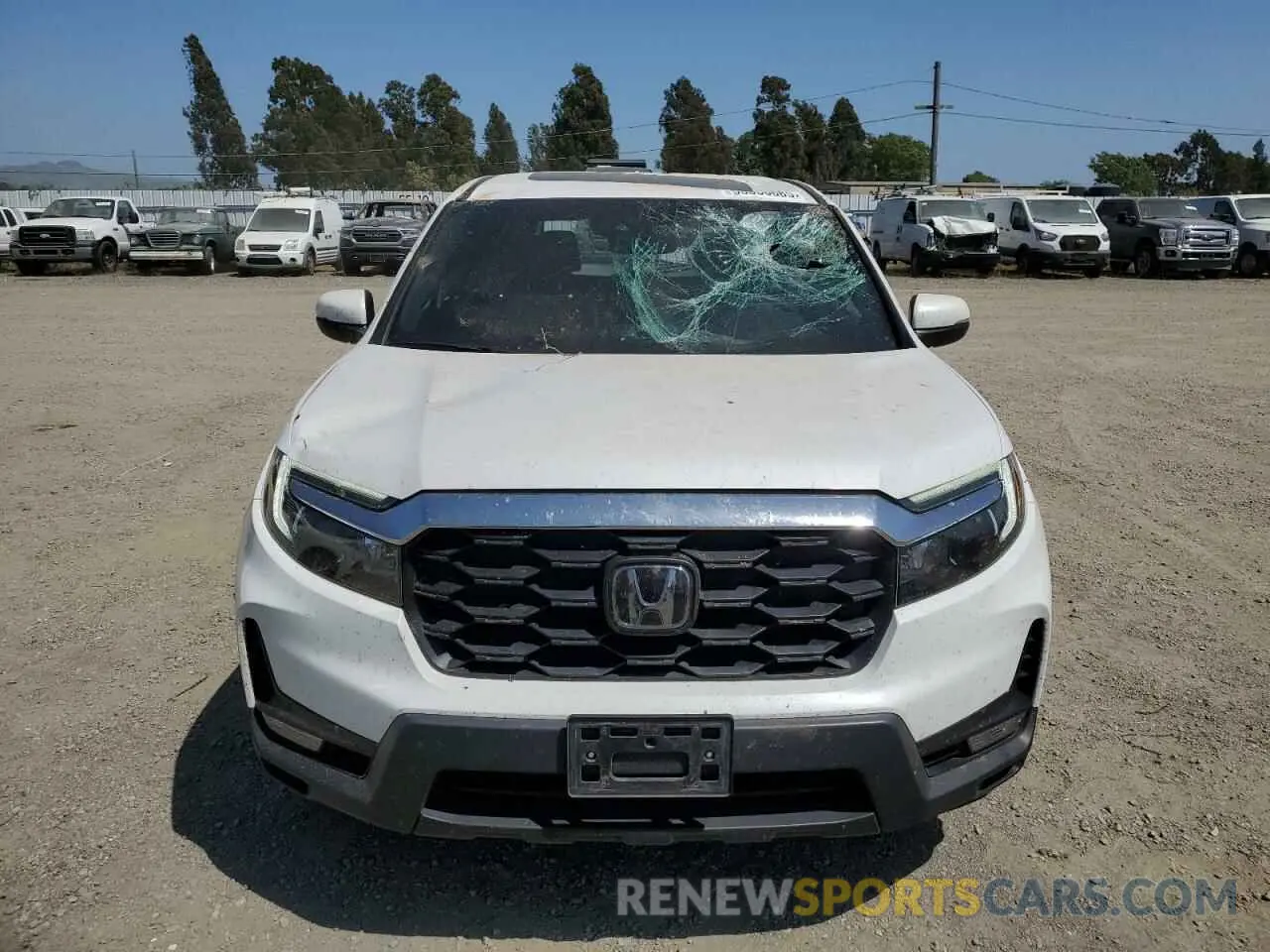 5 Photograph of a damaged car 5FNYF8H59PB010280 HONDA PASSPORT 2023