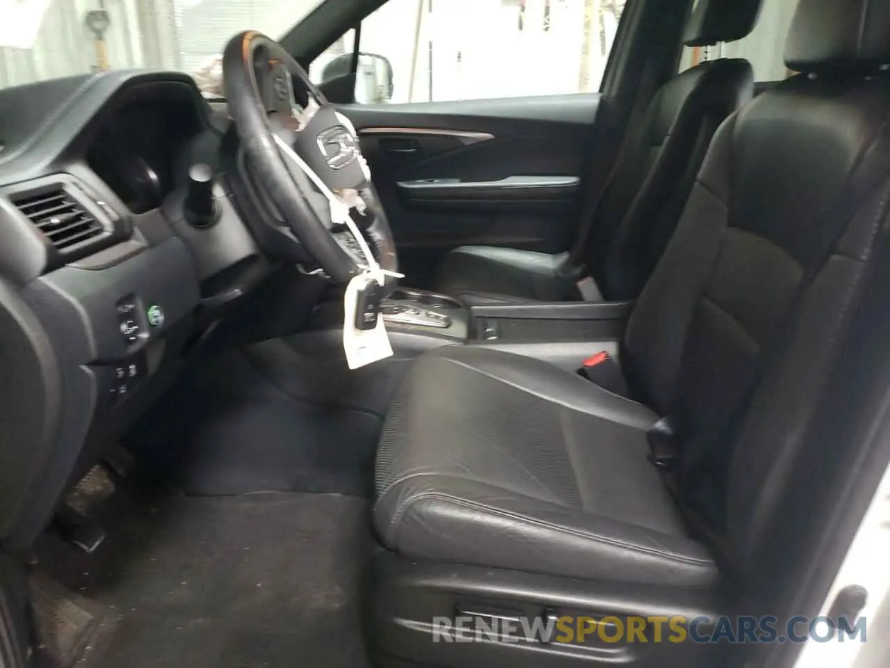 7 Photograph of a damaged car 5FNYF8H59PB011459 HONDA PASSPORT 2023