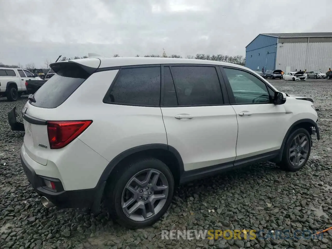 3 Photograph of a damaged car 5FNYF8H59PB041173 HONDA PASSPORT 2023