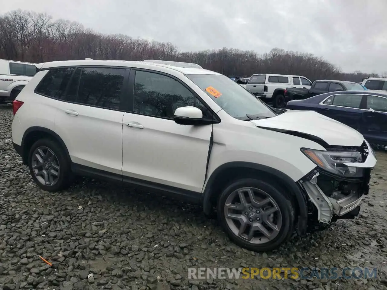 4 Photograph of a damaged car 5FNYF8H59PB041173 HONDA PASSPORT 2023