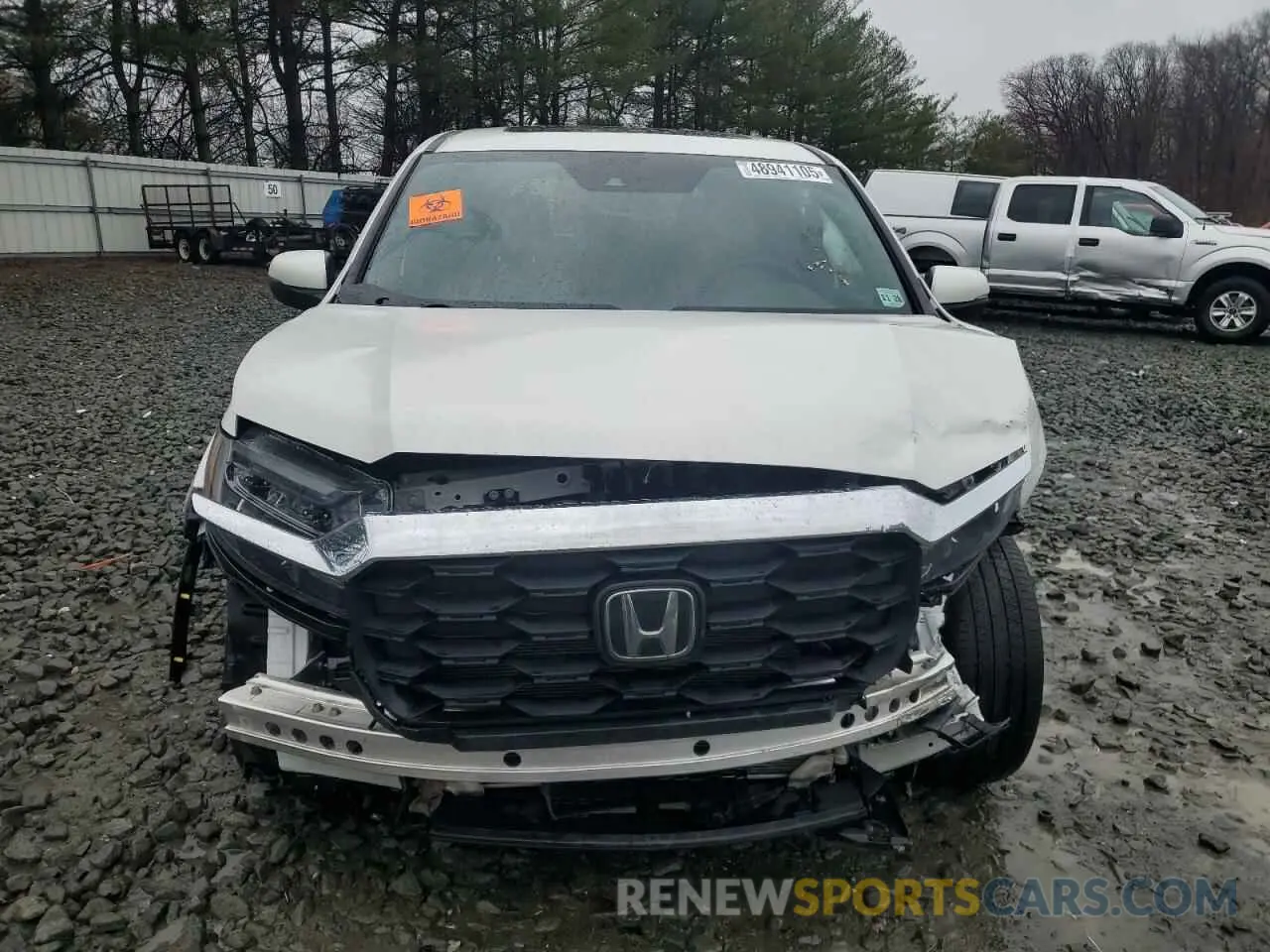 5 Photograph of a damaged car 5FNYF8H59PB041173 HONDA PASSPORT 2023