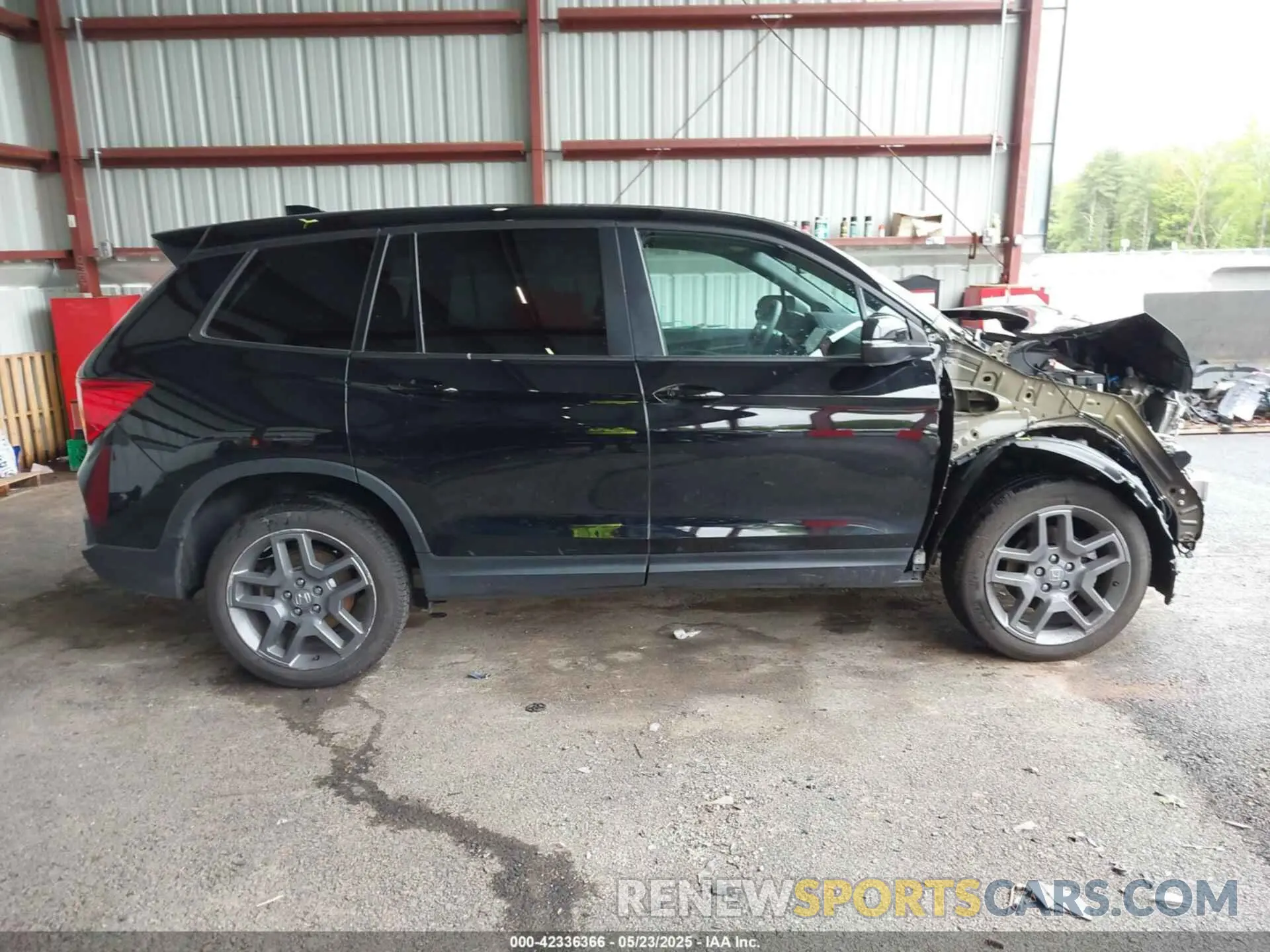 14 Photograph of a damaged car 5FNYF8H5XPB021370 HONDA PASSPORT 2023