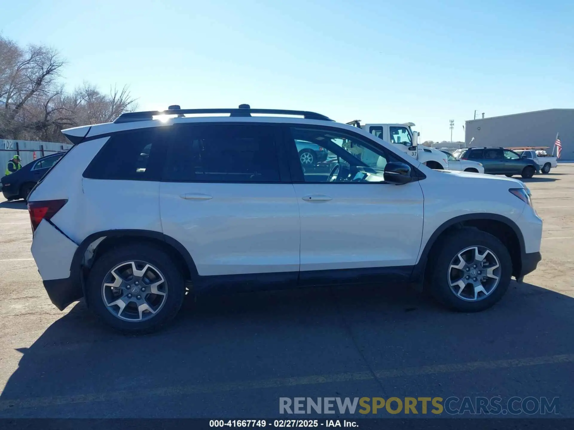 14 Photograph of a damaged car 5FNYF8H60PB015912 HONDA PASSPORT 2023