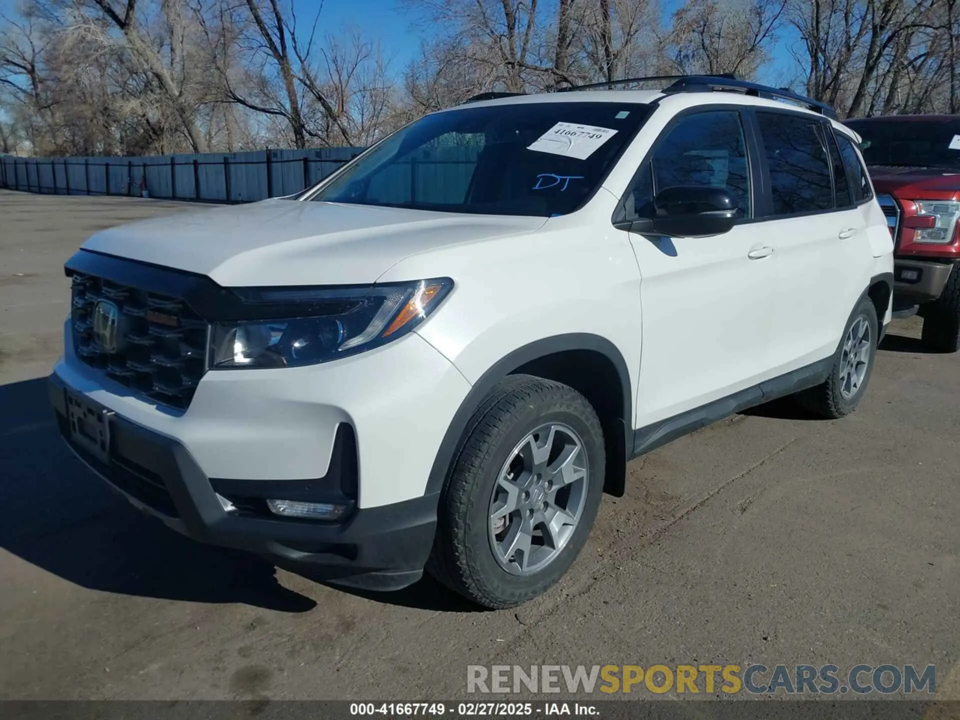 2 Photograph of a damaged car 5FNYF8H60PB015912 HONDA PASSPORT 2023