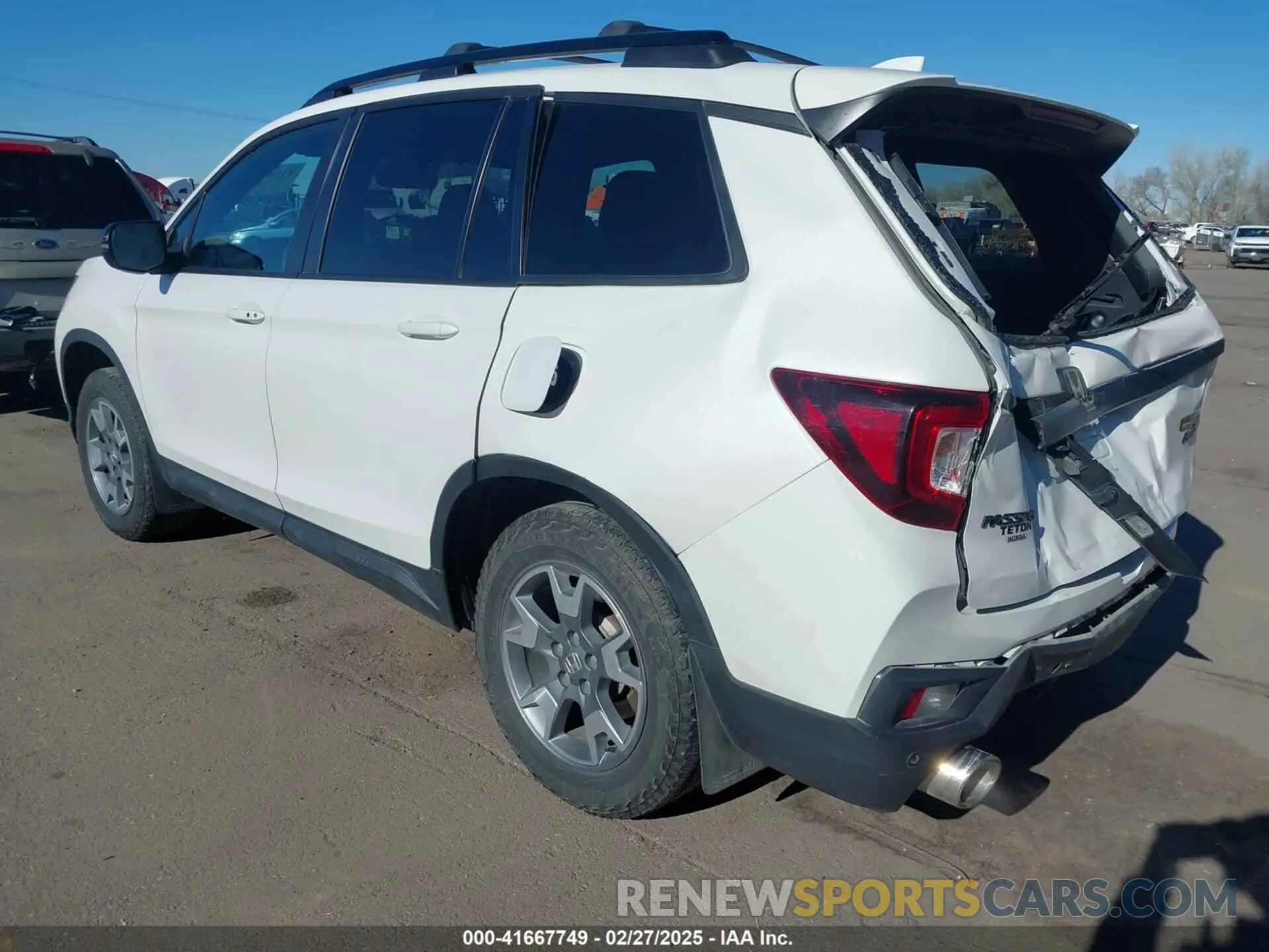 3 Photograph of a damaged car 5FNYF8H60PB015912 HONDA PASSPORT 2023