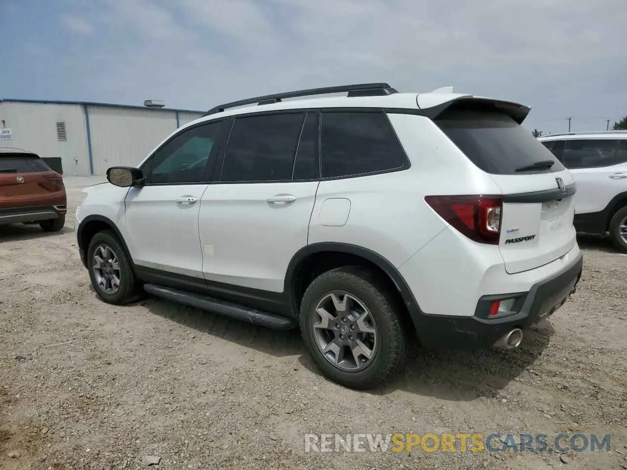 2 Photograph of a damaged car 5FNYF8H62PB040553 HONDA PASSPORT 2023