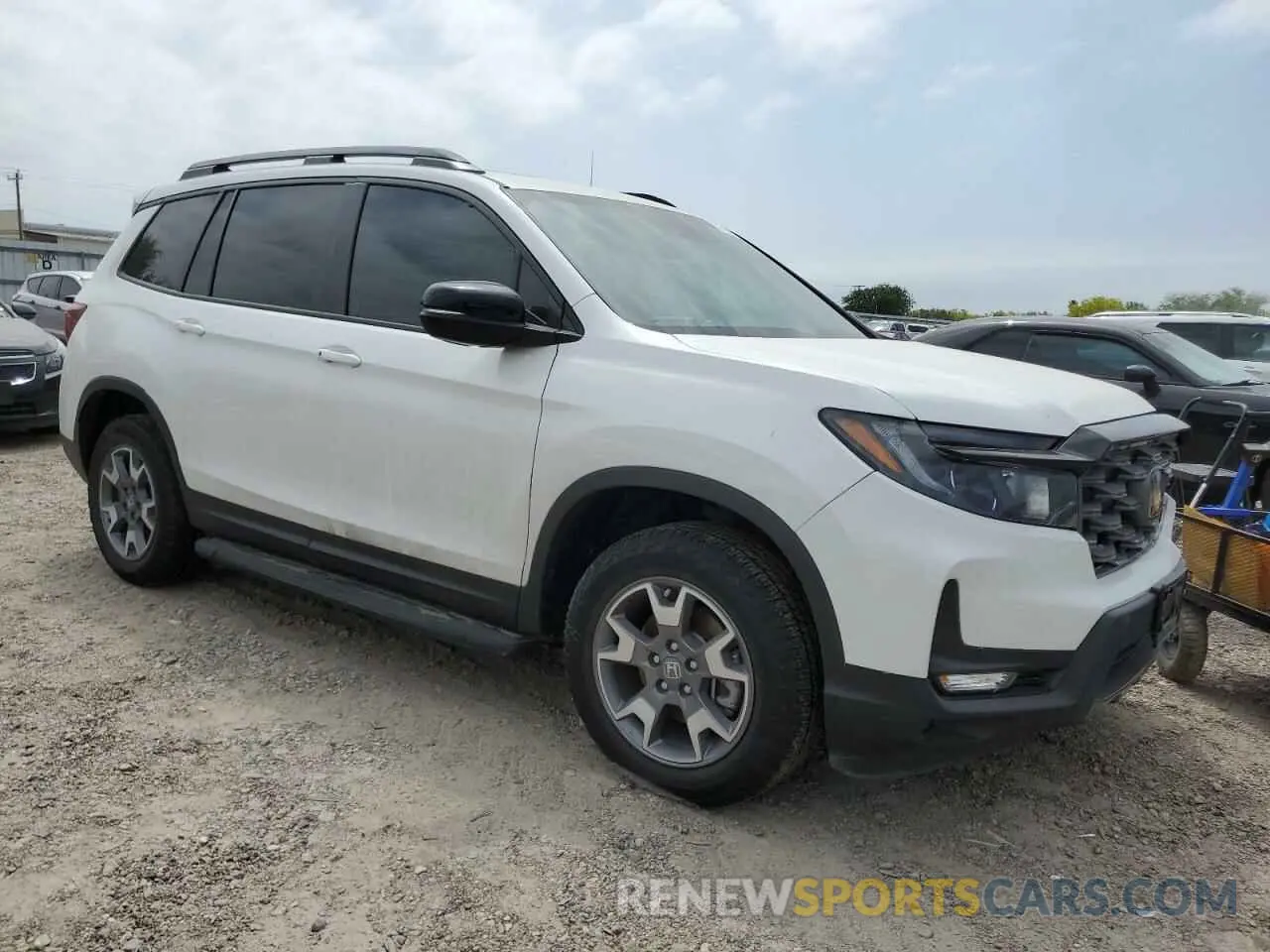 4 Photograph of a damaged car 5FNYF8H62PB040553 HONDA PASSPORT 2023