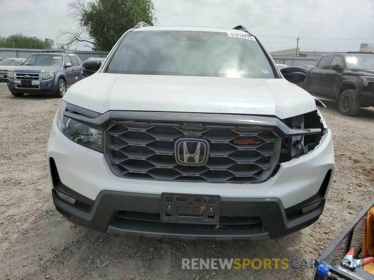 5 Photograph of a damaged car 5FNYF8H62PB040553 HONDA PASSPORT 2023