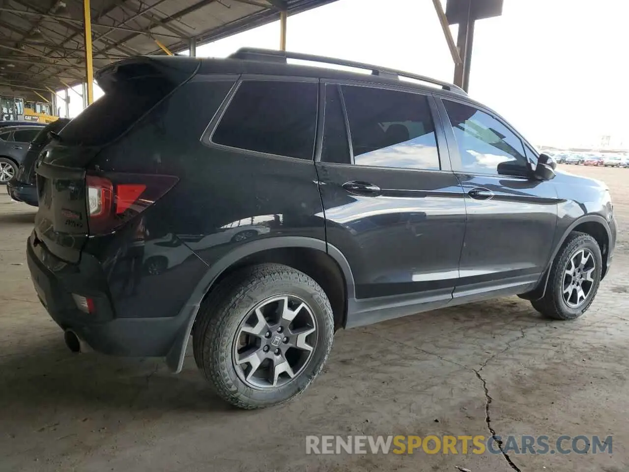 3 Photograph of a damaged car 5FNYF8H63PB008839 HONDA PASSPORT 2023