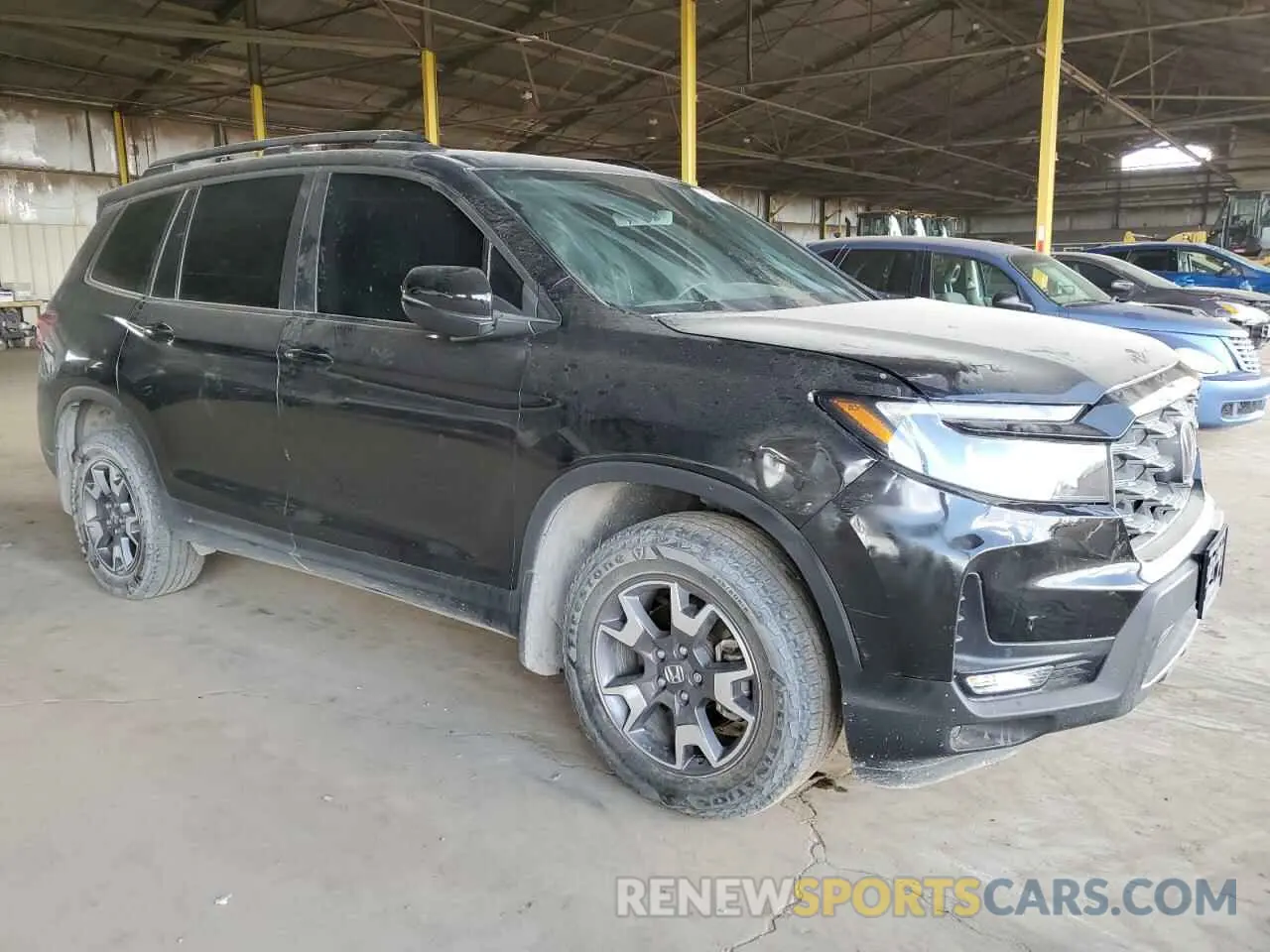 4 Photograph of a damaged car 5FNYF8H63PB008839 HONDA PASSPORT 2023