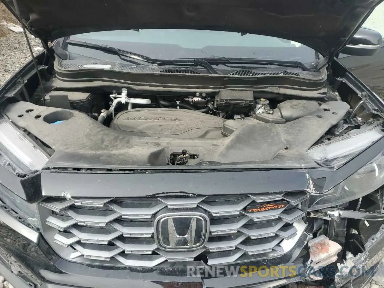 12 Photograph of a damaged car 5FNYF8H63PB010963 HONDA PASSPORT 2023