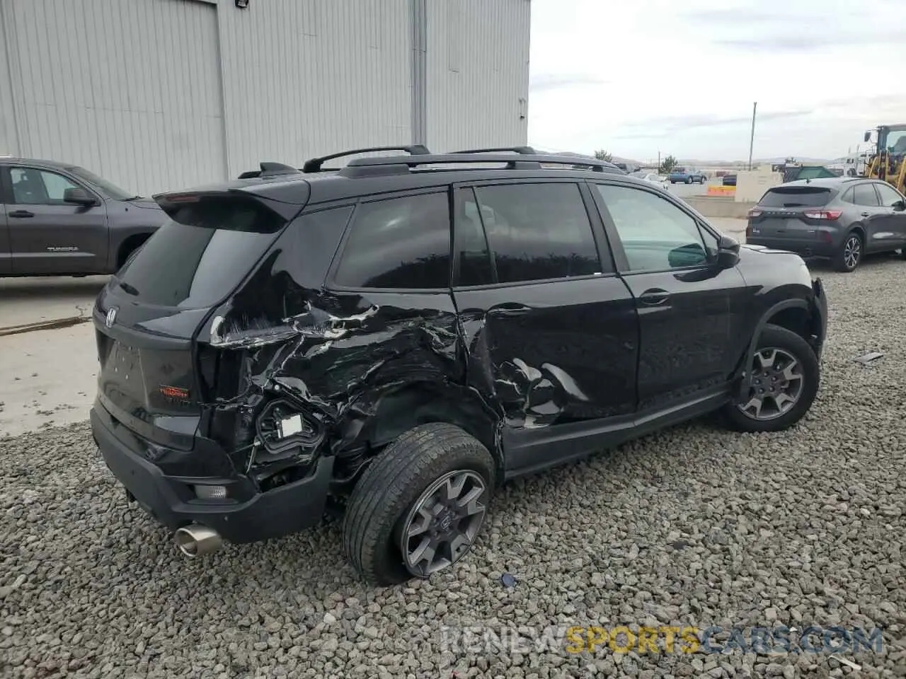 3 Photograph of a damaged car 5FNYF8H63PB010963 HONDA PASSPORT 2023