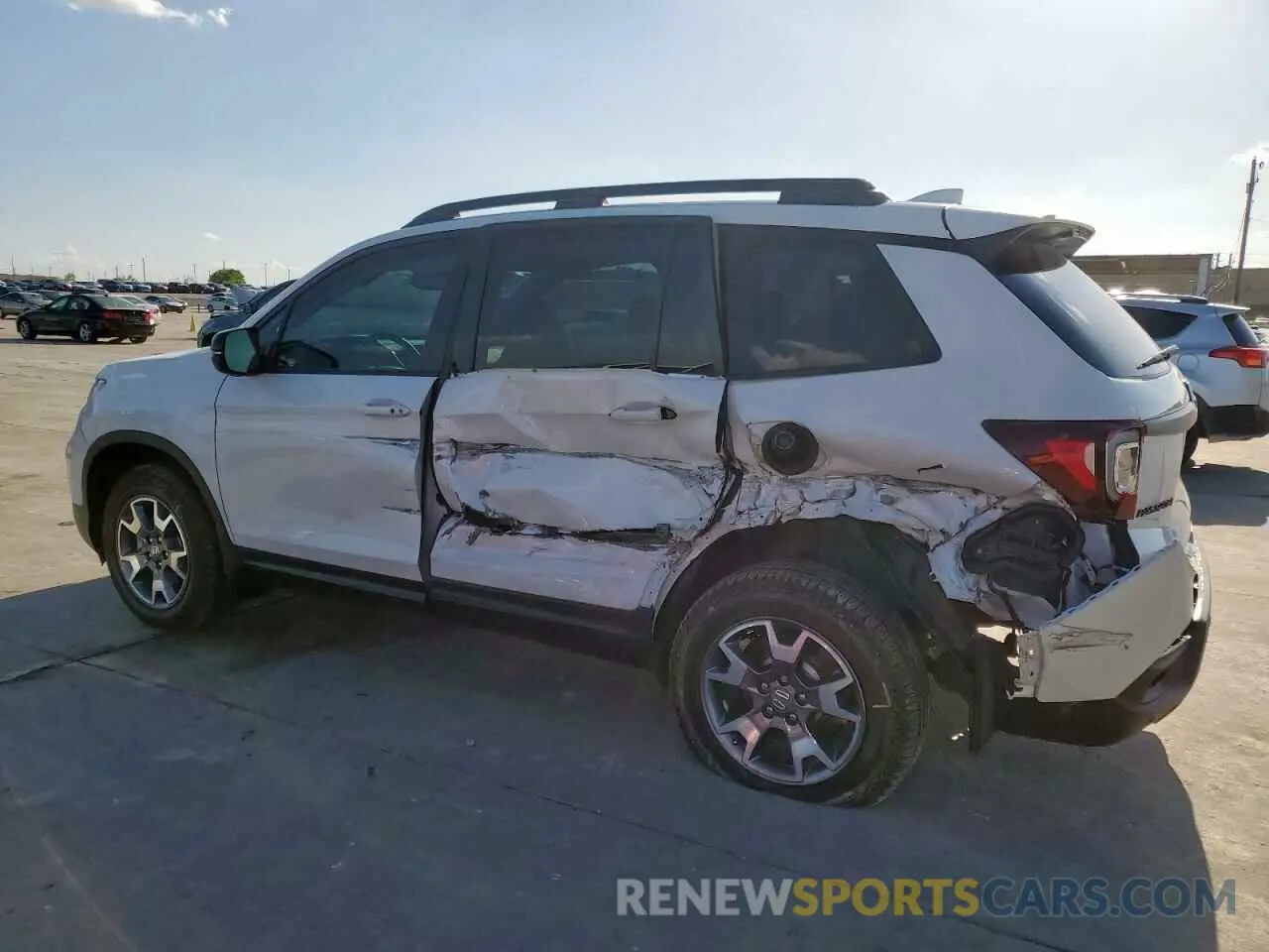2 Photograph of a damaged car 5FNYF8H64PB007652 HONDA PASSPORT 2023