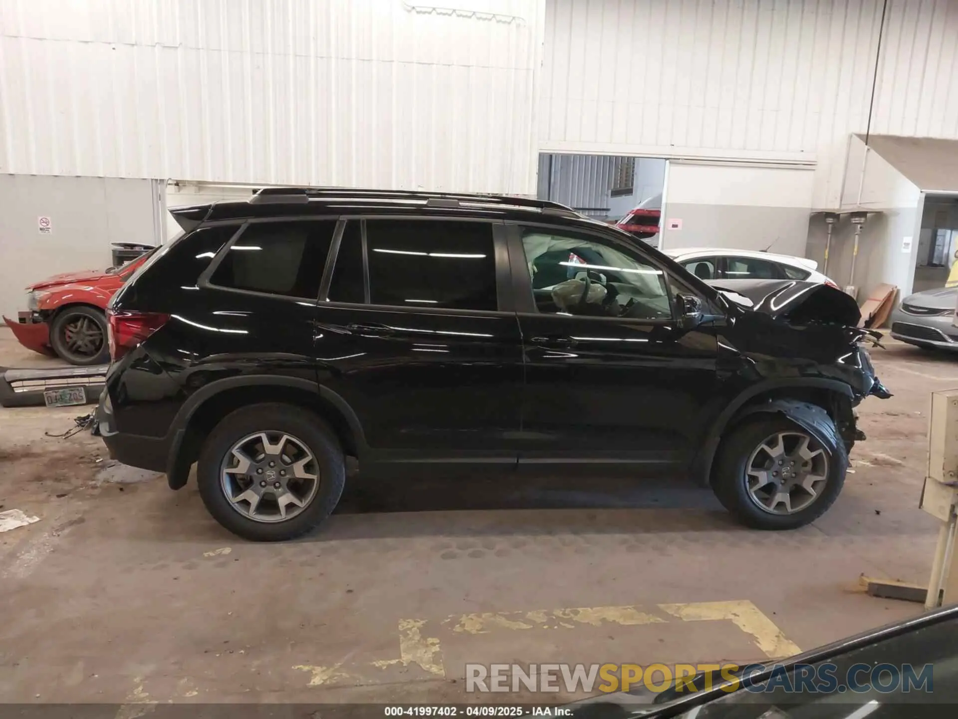 14 Photograph of a damaged car 5FNYF8H64PB016819 HONDA PASSPORT 2023