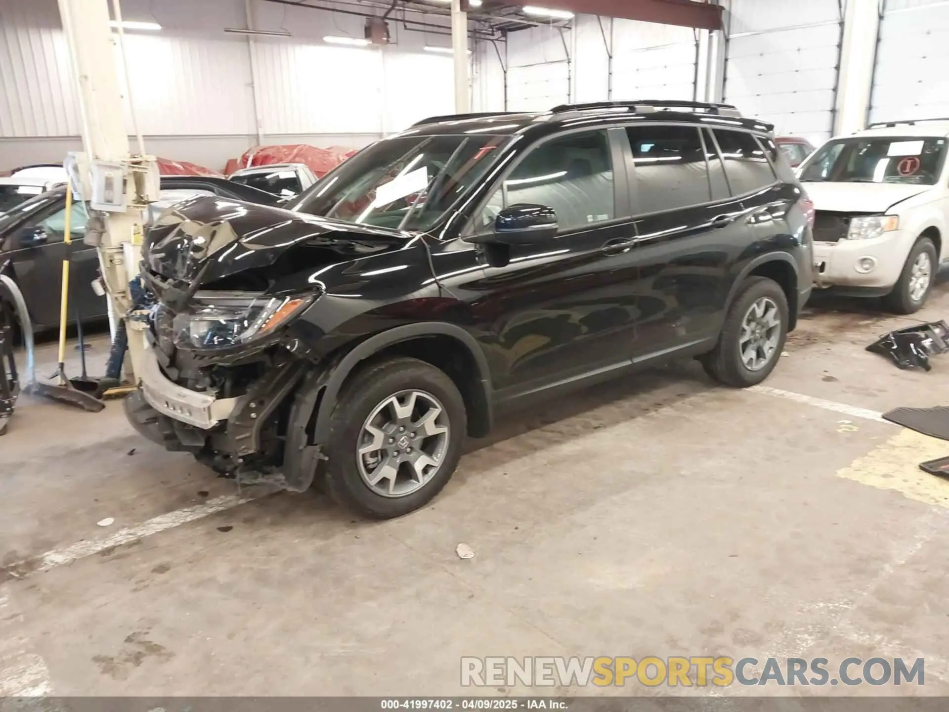 2 Photograph of a damaged car 5FNYF8H64PB016819 HONDA PASSPORT 2023