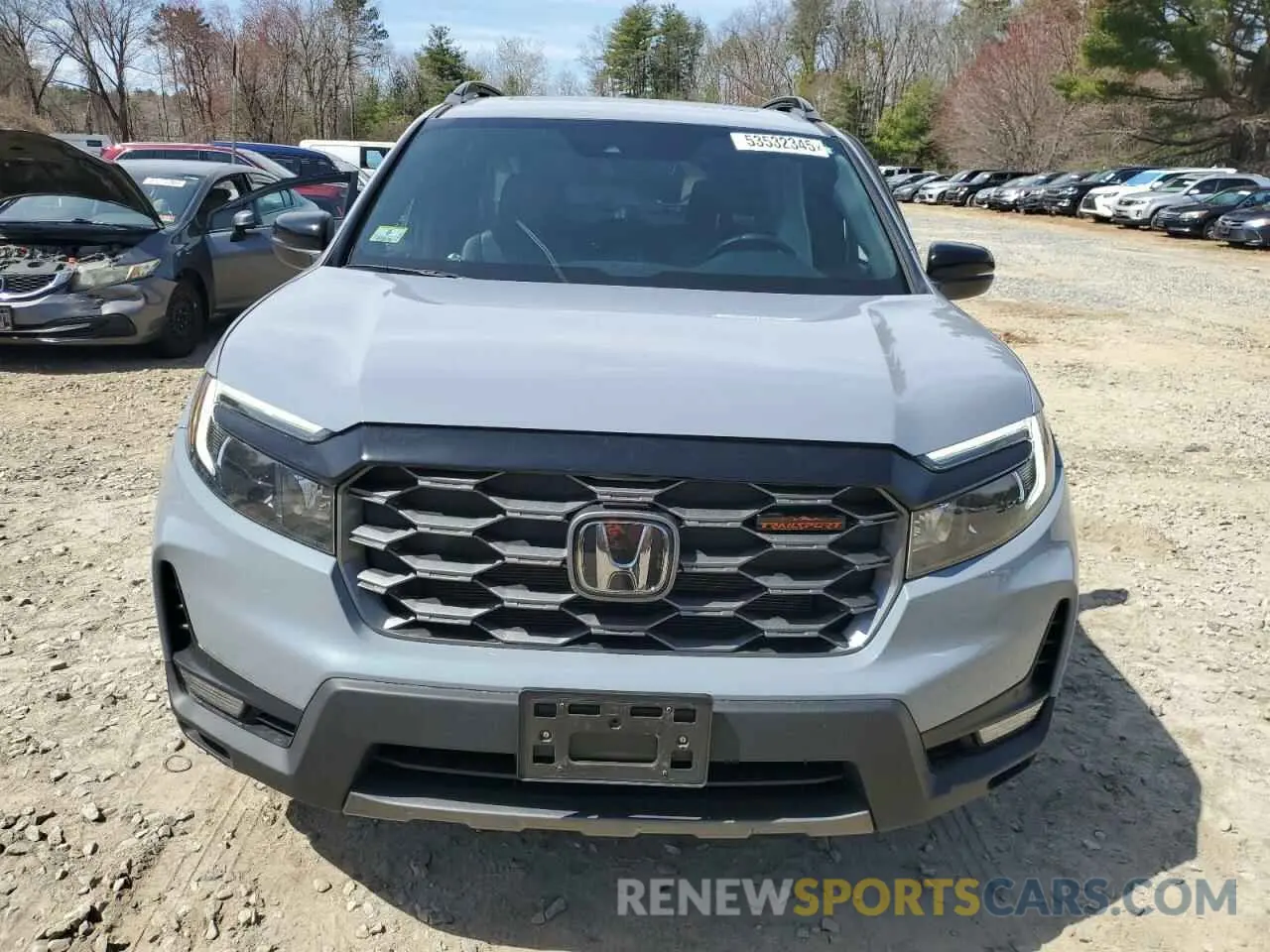 5 Photograph of a damaged car 5FNYF8H64PB032311 HONDA PASSPORT 2023
