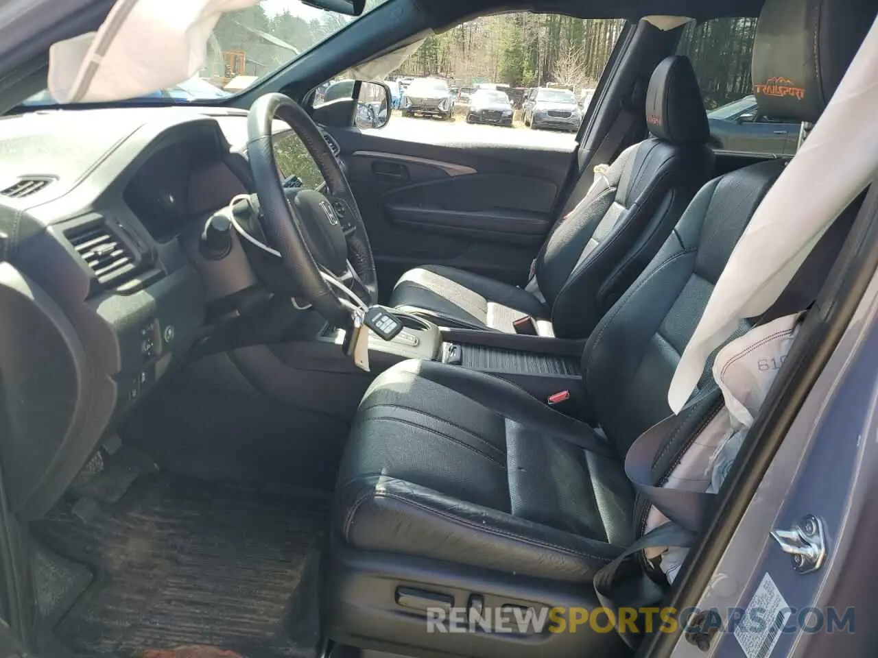 7 Photograph of a damaged car 5FNYF8H64PB032311 HONDA PASSPORT 2023