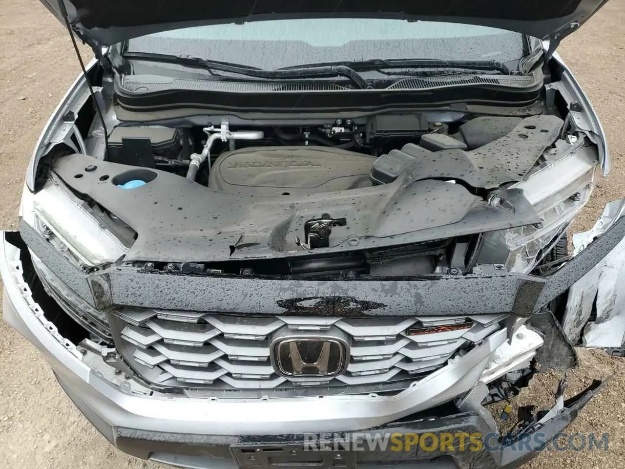 11 Photograph of a damaged car 5FNYF8H64PB044233 HONDA PASSPORT 2023