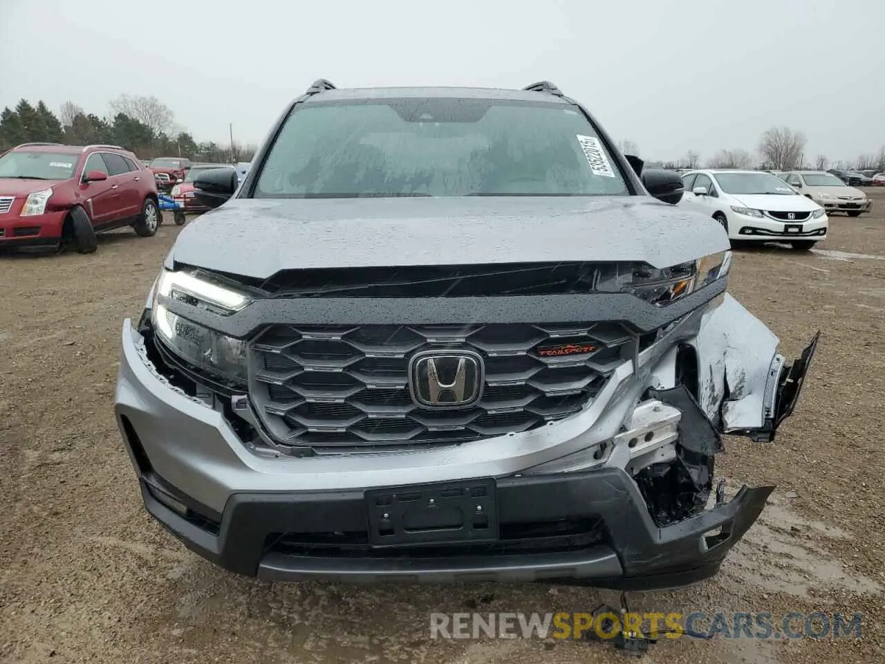 5 Photograph of a damaged car 5FNYF8H64PB044233 HONDA PASSPORT 2023