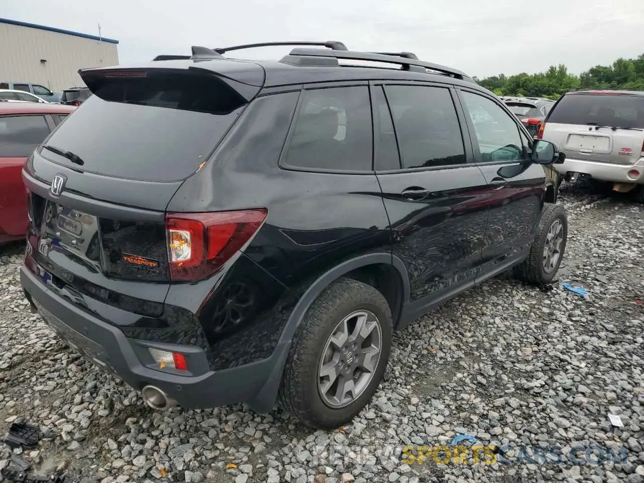 3 Photograph of a damaged car 5FNYF8H65PB000869 HONDA PASSPORT 2023